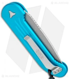 Microtech LUDT Automatic Knife Turquoise (3.4" Apocalyptic) 135-10APTQ -Knife Discounts Store Microtech LUDT Auto Turquoise Apocalyptic 135 10APTQ BHQ 106930 jr side